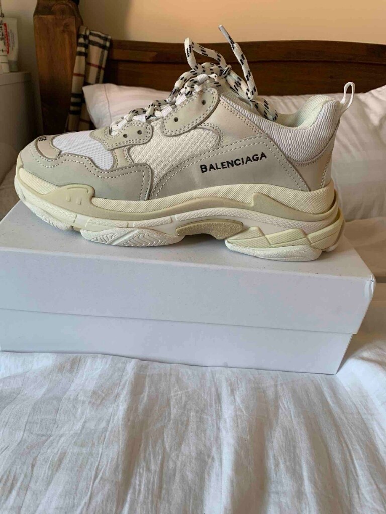 The pair of Balenciaga Triple S on the post of